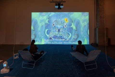 Photo: Viewers experiencing a dialogue with a fictional bird