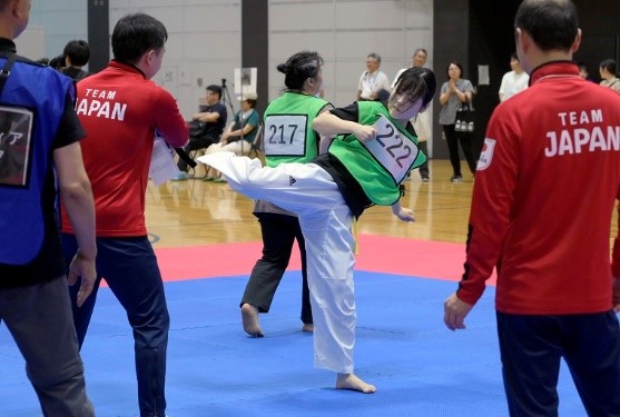 Photo: Taekwondo players performing sharp moves