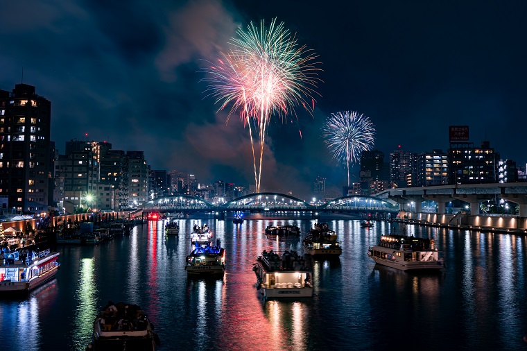 Houseboats and fireworks at the Sumida River