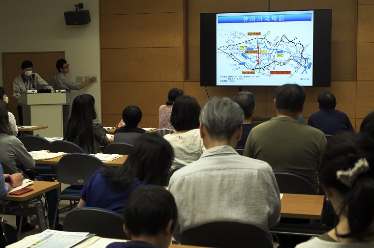 Photo: Participants listening to explanations of the Kanda River basin.