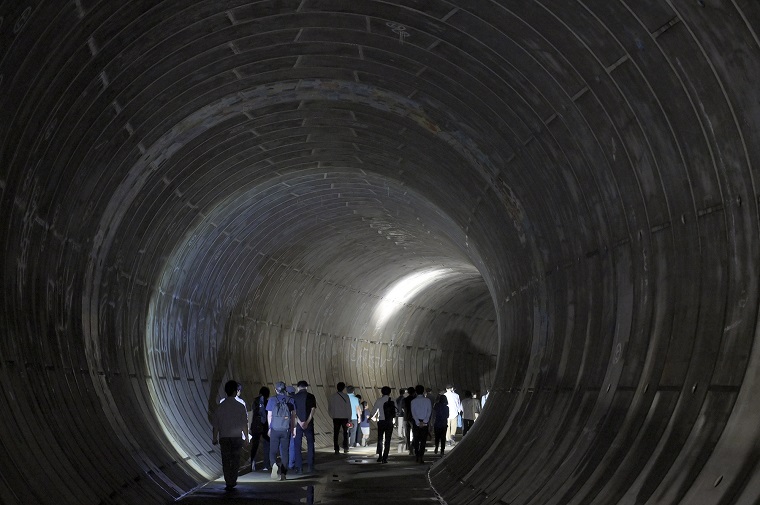 Photo: Participants walking through the regulating reservoir